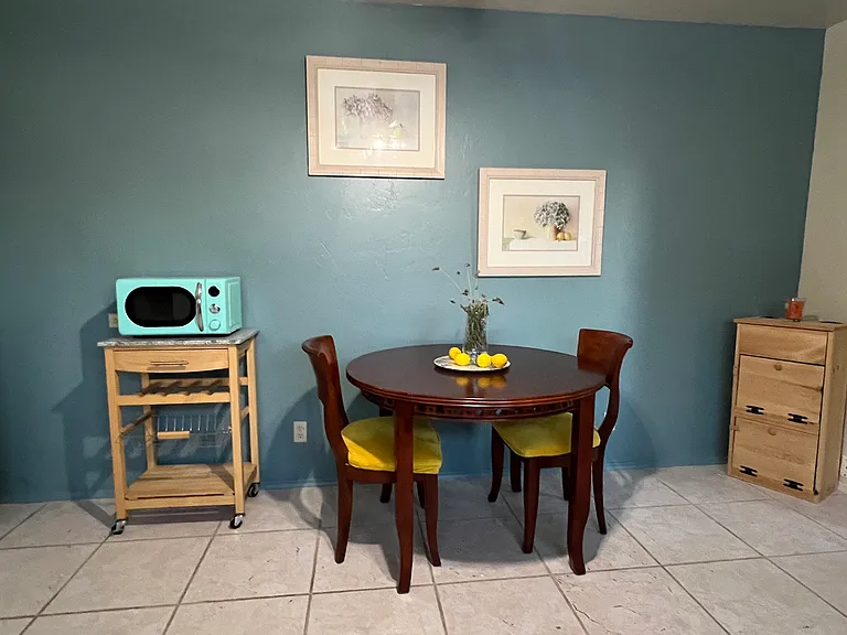 Dining area and rolling cart with microwave