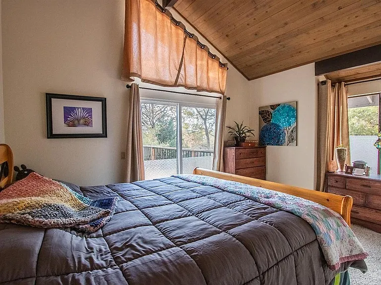 Downstairs bedroom
With access to deck