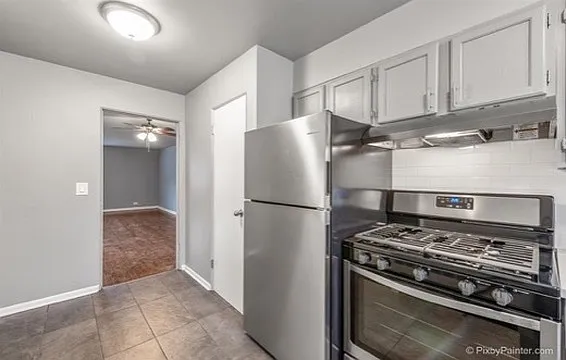 Building Photo - 7427 N Winchester Ave #102