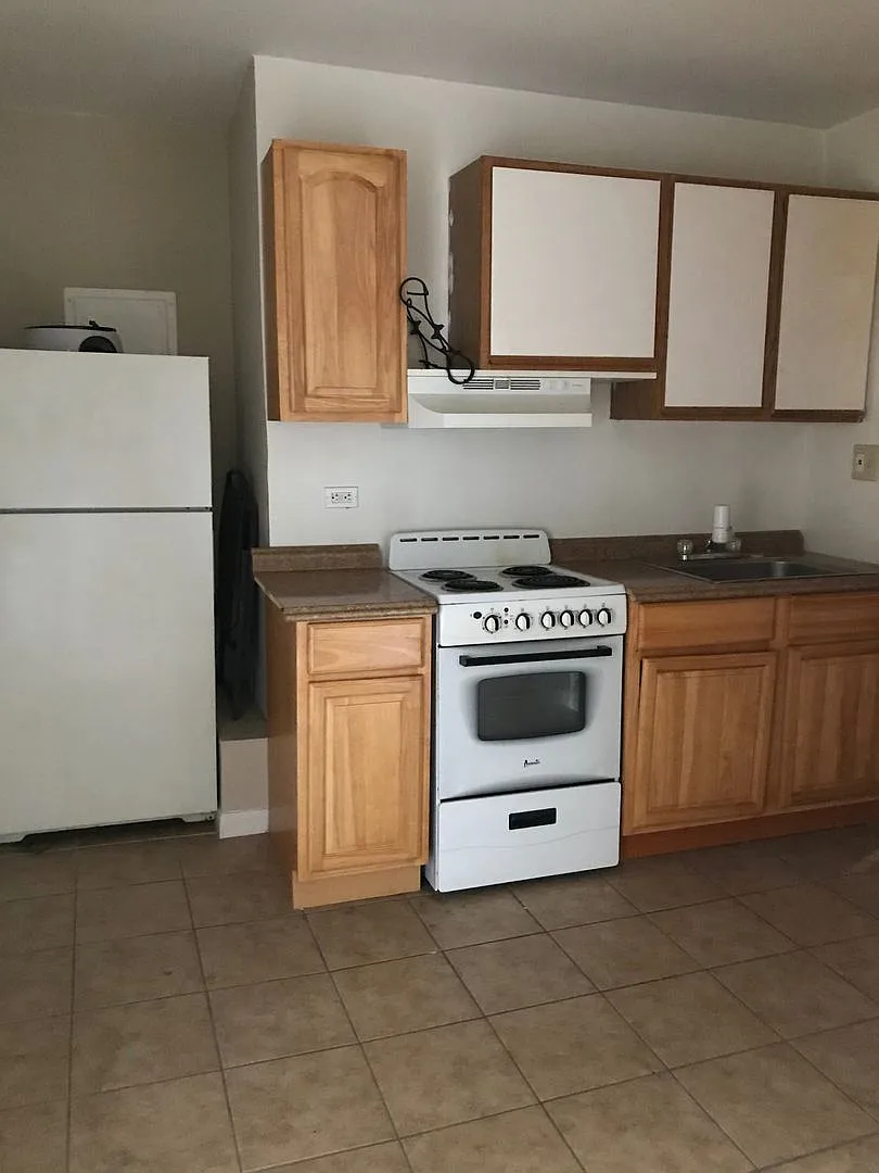 4800-02 Woodland Ave. — Photo 3