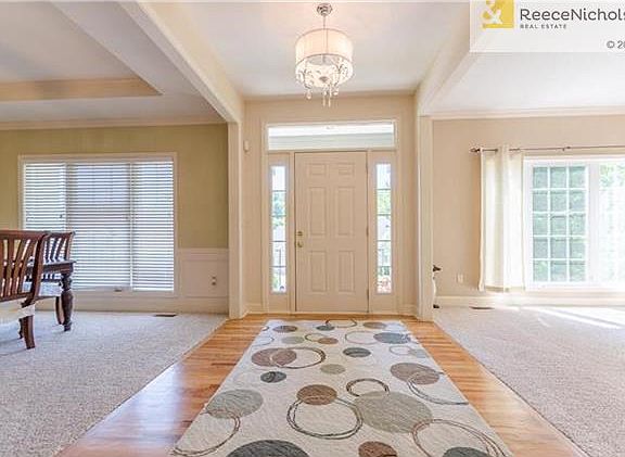 Front entry with view of formal dining room