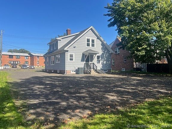 Rear of House & Driveway