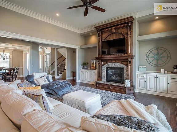 Great room with fireplace, built-ins and with lots of details and character.