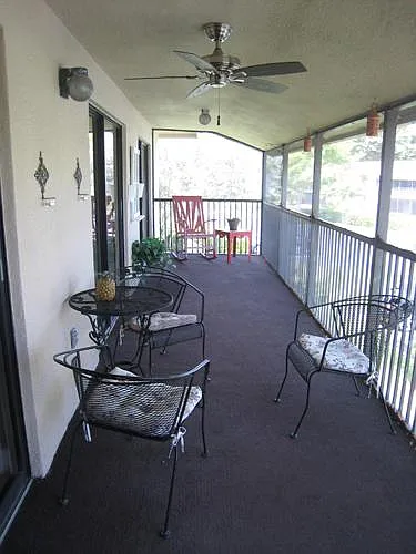 Large screened patio
with view of beautiful landscaping'