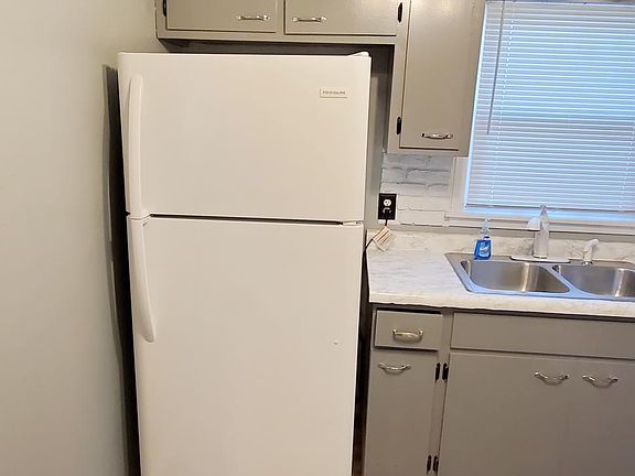 Kitchen and refrigerator view