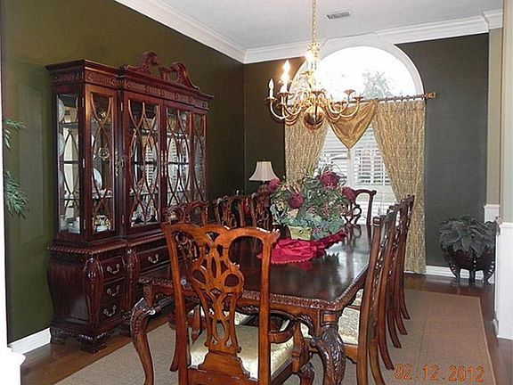 Get ready for those special occasions for a more formal dining experience.  Beautiful window treatments and Crown molding.