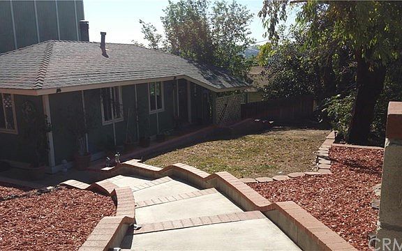 Easy caring lawn and planters provides lots of room to plant your favorite flowers.