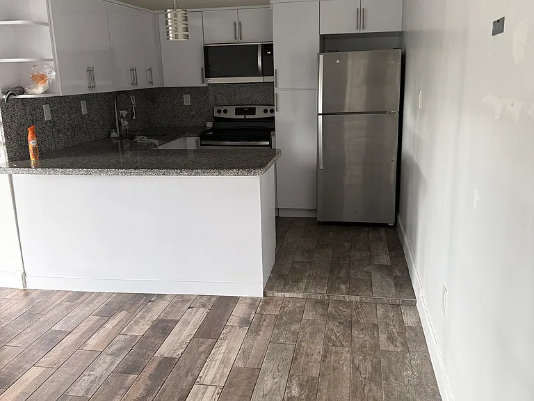 W 61st St — Photo 7