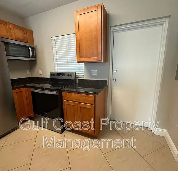 8555 Bernwood Cove Loop #103 — Photo 7