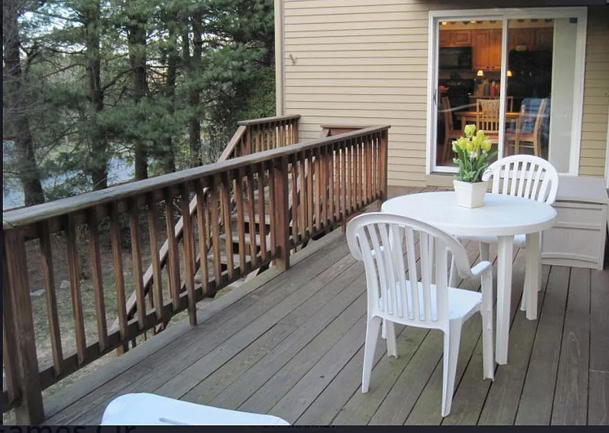 Front Deck looking at the kitchen french doors - 216 Captain Eames Cir