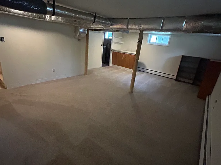 Finished side of basement- new carpet and paint