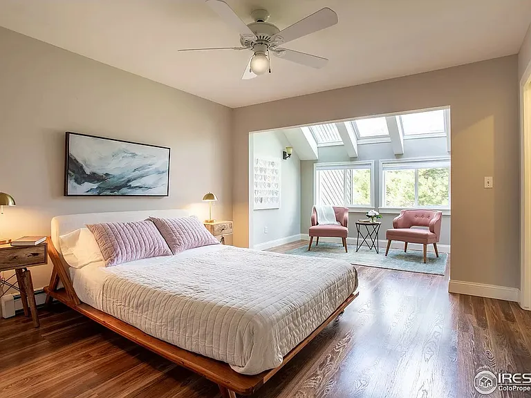 The 2nd floor large bedroom now features a heat pump on the far wall in the photo.