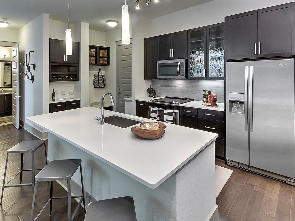 Expansive kitchen island in select homes.