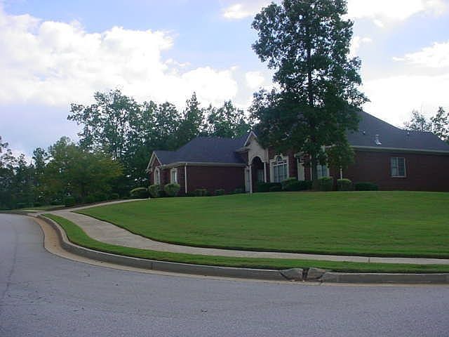 Corner to Corner-Circular Drive in Front plus 2 car gar.  4 sided brick!  WOW!