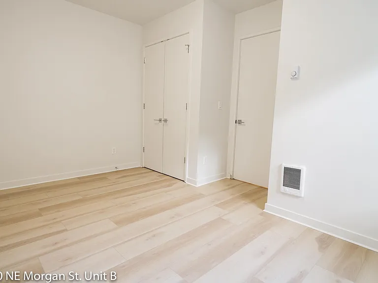 Bedroom features closet, wall heaters and LVP flooring throughout