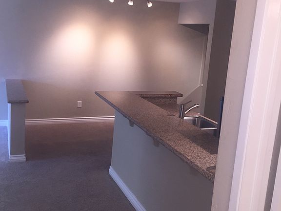 Granite counters, wood floor, brand new stainless steel appl