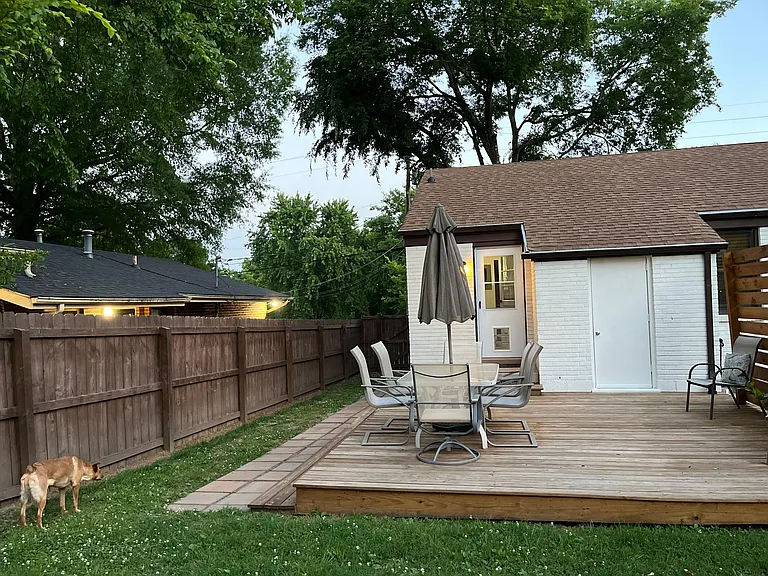 backyard looking towards patio (example with furnishing)