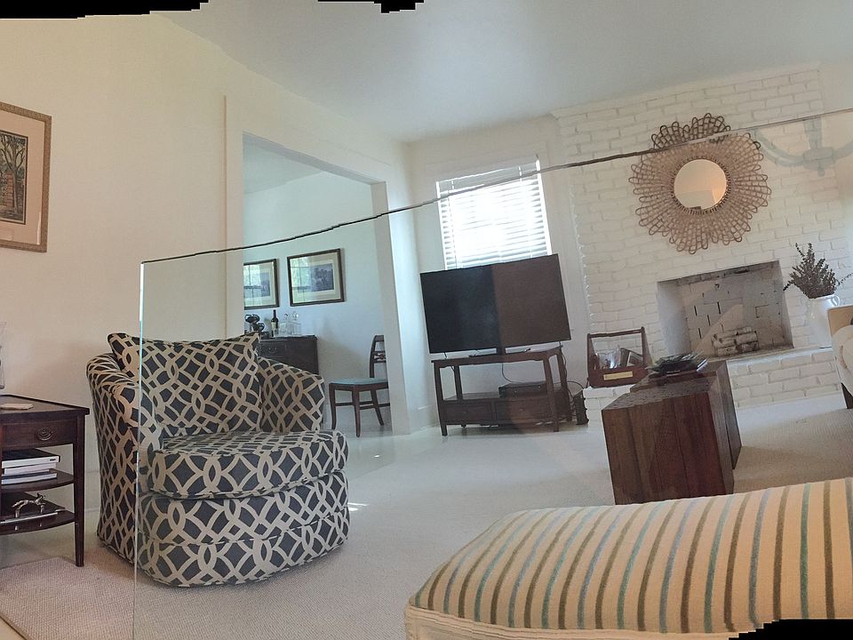 Living room located upstairs. Separated from staircase by a