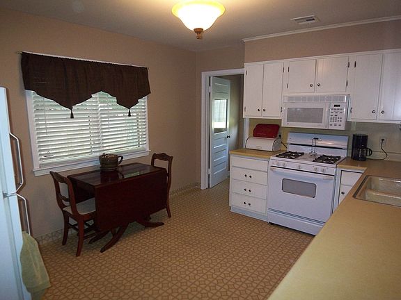 Classic 1950s kitchen with updated appliances.