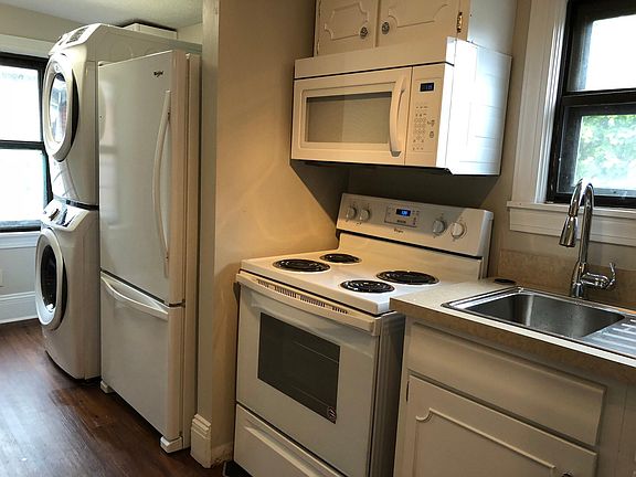 Kitchen with washer and dryer