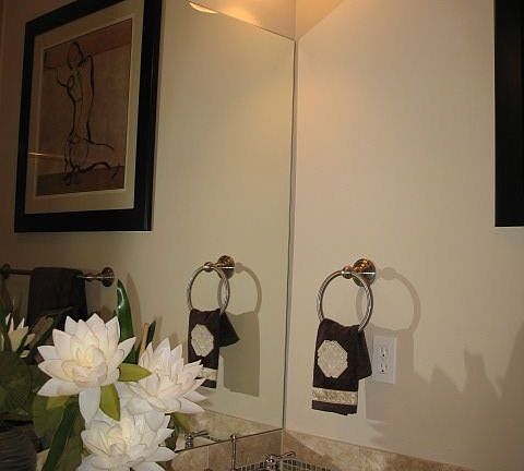 Master bath:dual vanity,stone tile countertps & backsplsh, tile flrs & shower!