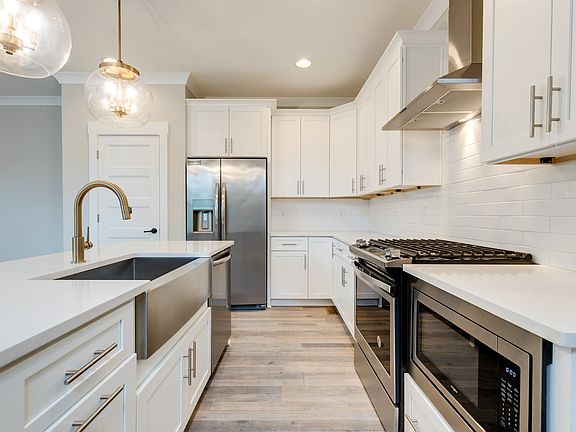 Gas Stove, Microwave, Dishwasher and Refrigerator included.