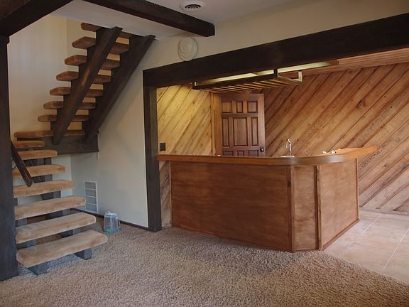 Downstairs living with bar