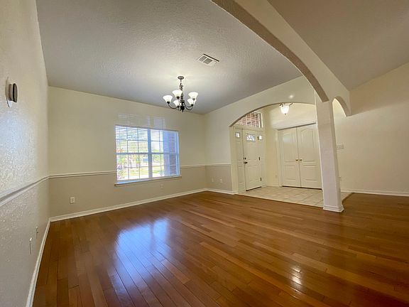 Beautiful archways surround the formal dining area which can also be used in a number of ways as additional living space.