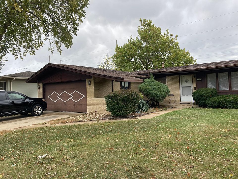 Front Yard and 2 car garage