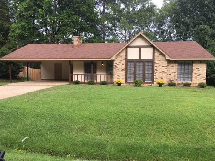Front view with carport
