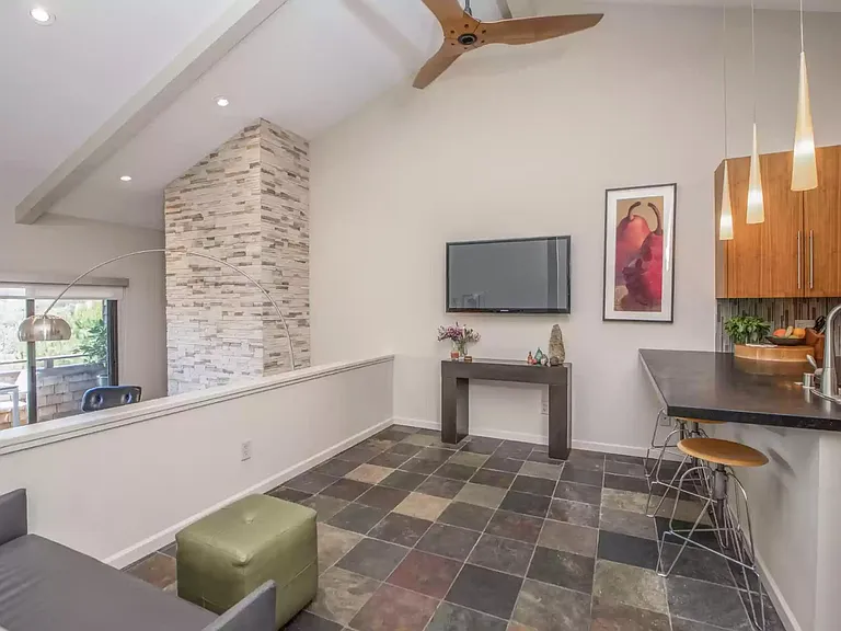Seating/TV (or dining area) adjacent to kitchen