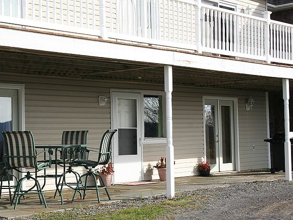 Patio with Deck above