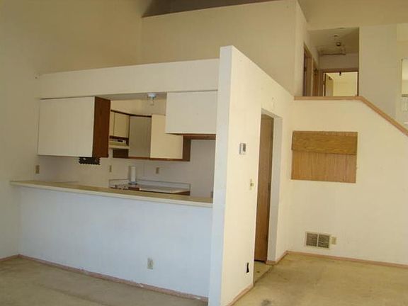 Partial view of 2nd floor and Kitchen with high top breakfast nook. New pics of updated kitchen coming soon!