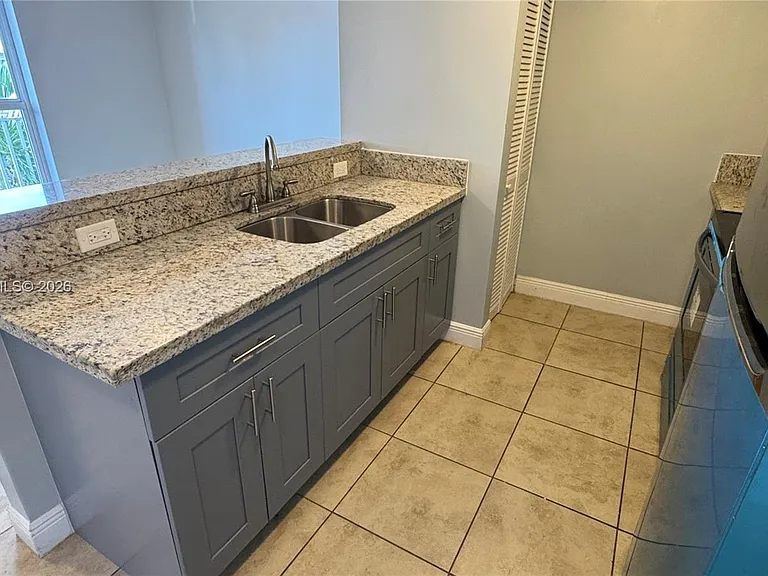 1955 NW 5th Pl #11 — Photo 6