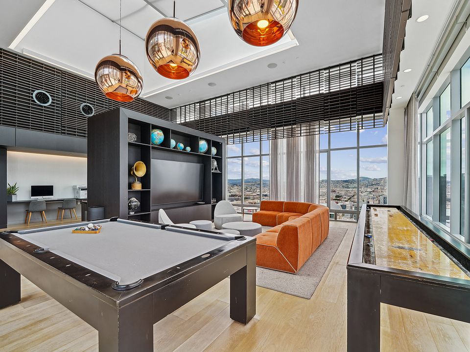 Game Solarium with a Pool Table and Shuffle Board