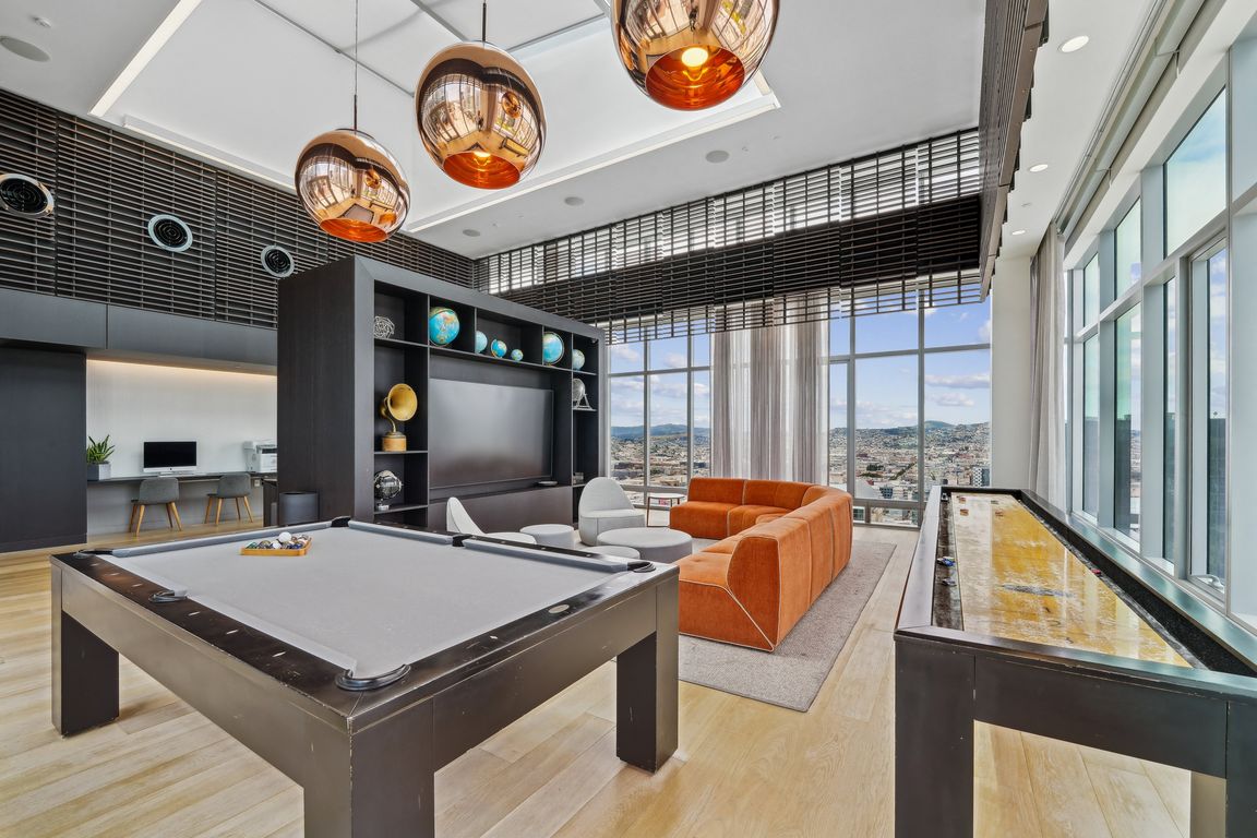 Game Solarium with a Pool Table and Shuffle Board