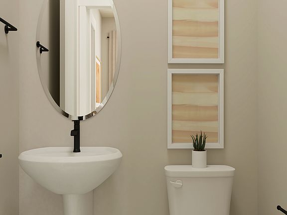 This floor plan features a separate powder bathroom.