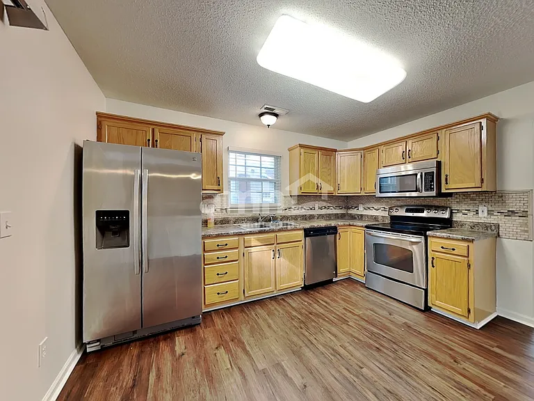 316 Windsong Dr — Photo 3