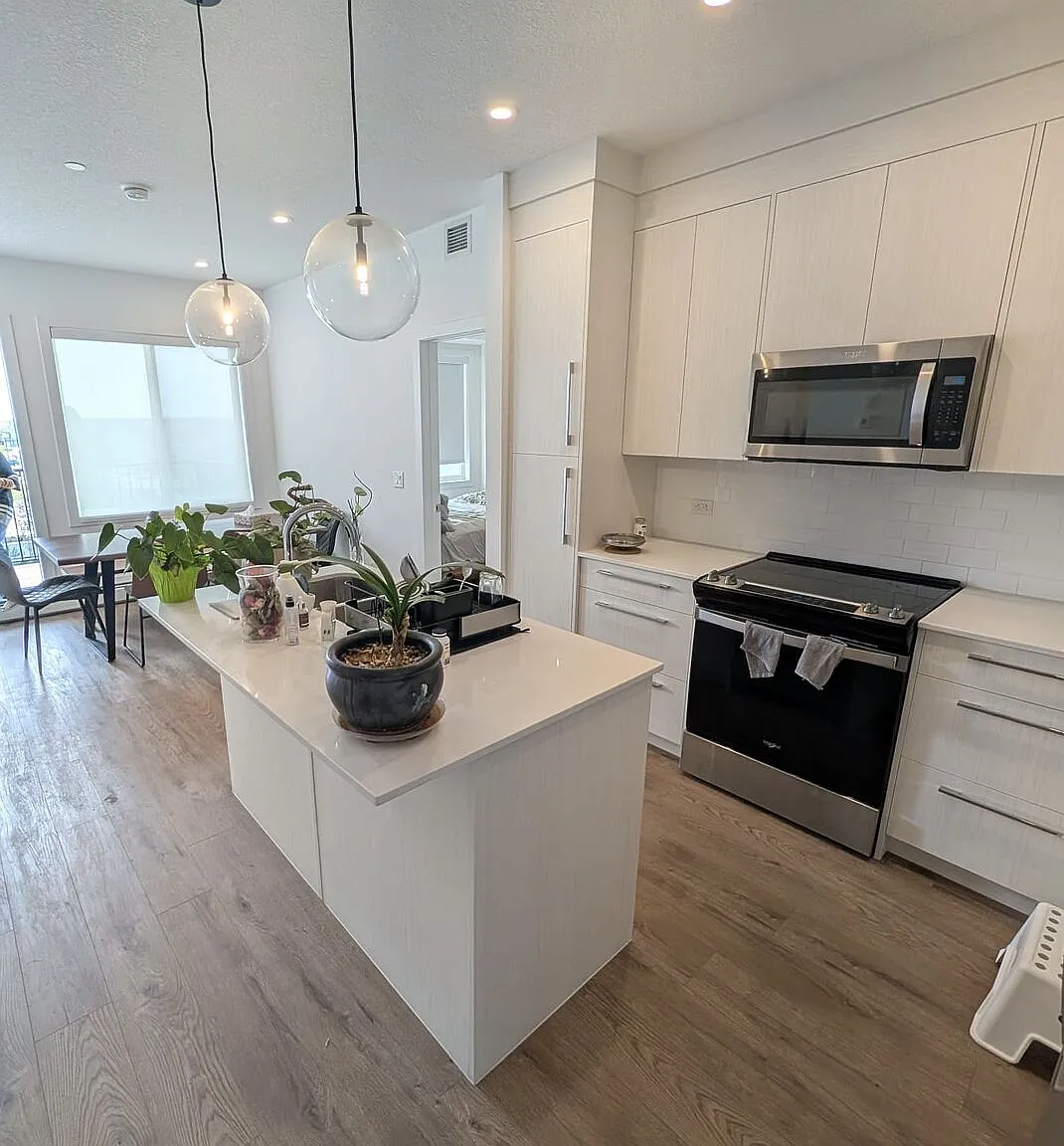 Modern 2 Bedroom + Den Condo with Underground Parking in Skyview Ranch (IP059) — Photo 1