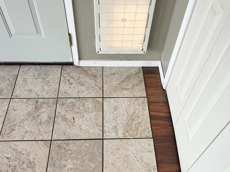 Dog door with private fenced in side yard. Coast closet.