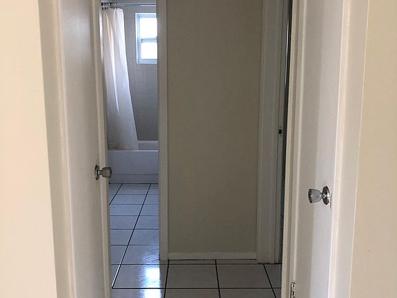 Hallway to bedrooms and bathroom