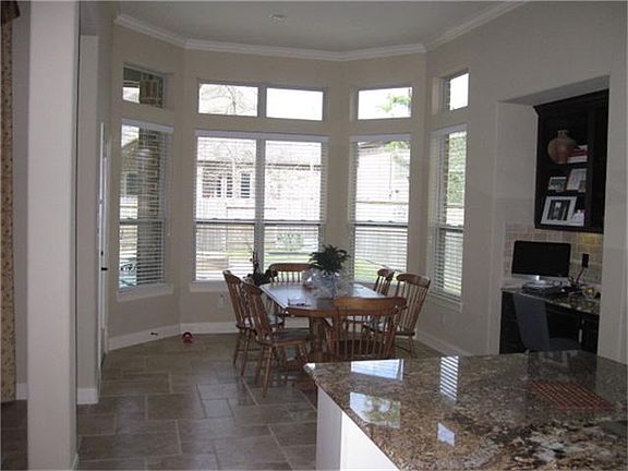 Large breakfast room with built in Workstation/Desk.