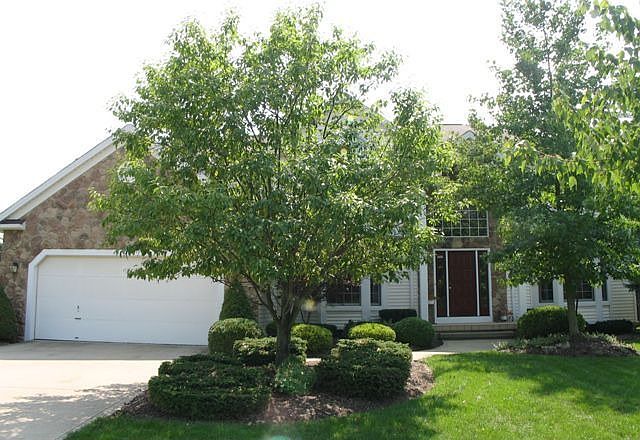 Beautiful colonial on treed setting!