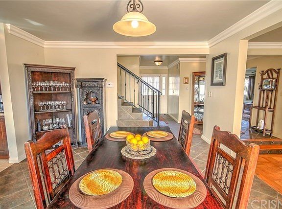 Formal dining area opens to the step down living room and newly remodeled kitchen.