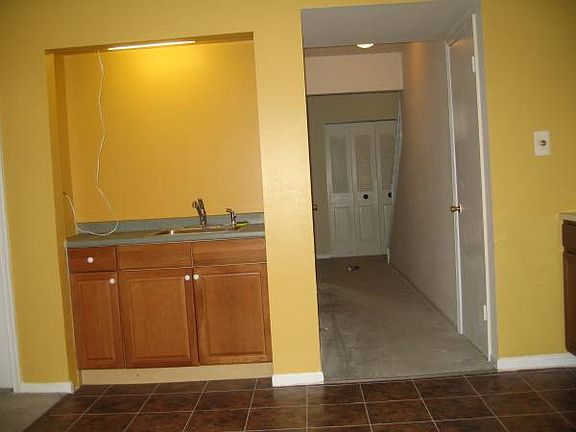 Foyer and kitchen sink.
