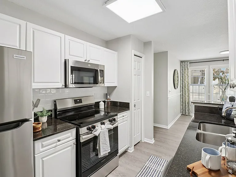 Bright kitchen with breakfast bar and open-concept layout