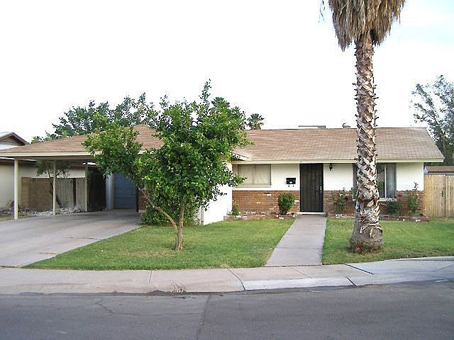 Two car carport and a 1 car garage 
