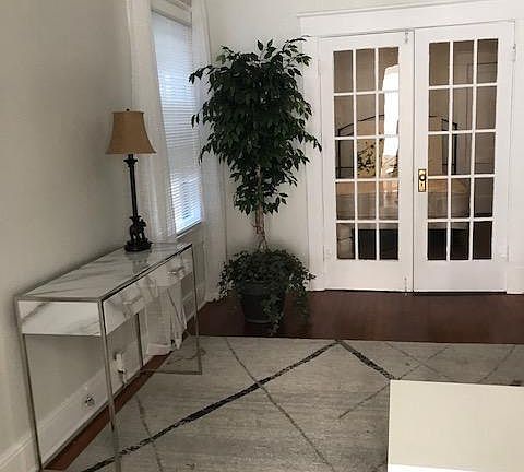 French Doors lead to Bedroom