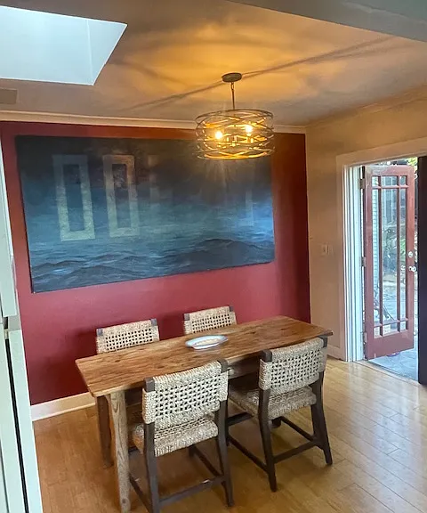 Dining room opens up to kitchen, living room and stone patio