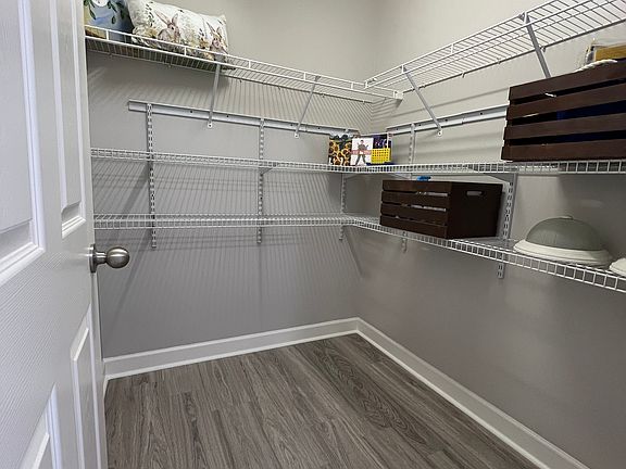 This large walk-in closet is on the second floor just off the hallway and is a bonus storage space.